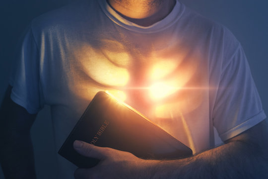 Glowing heart and Bible