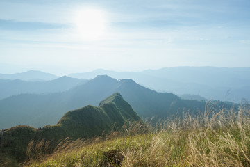 Landscape Mountain and tree at Khao Chang Puak at Thong Pha Phum National Park, Kanchanaburi, Thailand, Mountain view with clouds and blue sky.