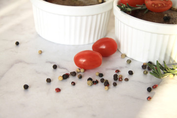 Fresh pate with red tomatoes, pepper and cream