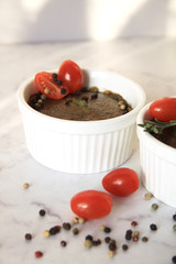 Fresh pate with red tomatoes, pepper and cream