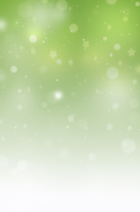 Christmas background with blur green lights
