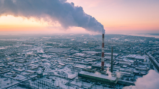 Aerial view of Combined heat and power plant in industrial zone. Cheboksary City, Russia. Heavy industry from above.