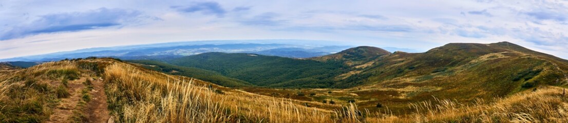 Beautiful panoramic view of the Bieszczady mountains in the early autumn, Bieszczady National Park (Polish: Bieszczadzki Park Narodowy), Poland. © udmurd