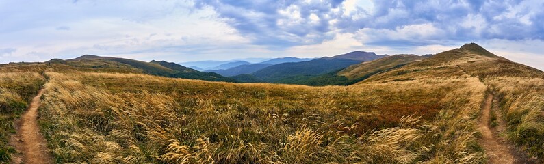 Beautiful panoramic view of the Bieszczady mountains in the early autumn, Bieszczady National Park (Polish: Bieszczadzki Park Narodowy), Poland. © udmurd