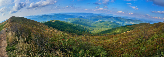 Beautiful panoramic view of the Bieszczady mountains in the early autumn, Bieszczady National Park (Polish: Bieszczadzki Park Narodowy), Poland. © udmurd