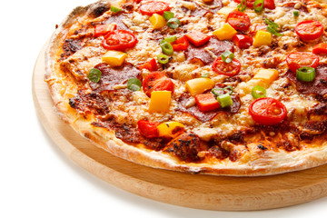 Pizza with ham and vegetables on white background