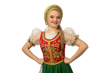 Beautiful smiling caucasian girl in russian folk costume isolated on white