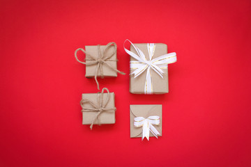 Brown gift box on red background