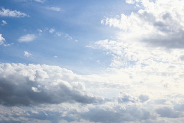 Fantastic soft white clouds against blue sky