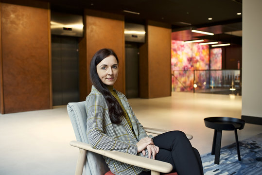 Portrait of a white businesswoman in a contemporary office