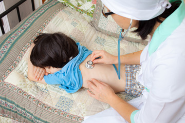 Obraz na płótnie Canvas doctor pediatrician with stethoscope