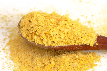 Flakes of Yellow Nutritional Yeast a Cheese Substitute and Seasoning for Vegan Diets