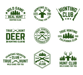 Set of isolated hunting emblems with deer and guns