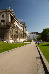 Obraz premium Old Classical palace with rusty exterior concrete marble in portrait perspective in Vienna Austria
