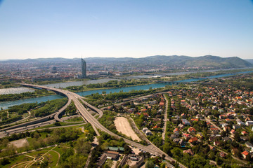 Architectural landscape second test aerial birds eye view of city skyline and roads with landscape and river Danube in clear blue sky background in Vienna Austria