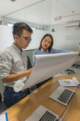 Business people sharing ideas about the plan research paper in the business meeting room