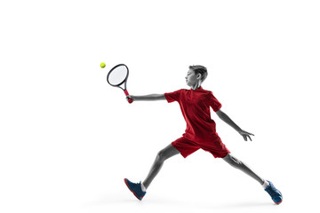 Fototapeta premium Young teen boy tennis player in motion or movement isolated on white studio background. The sport, exercise, training concept