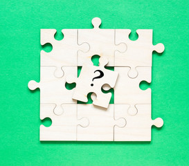 Puzzles with question mark on the green background.