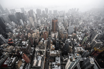 Fototapeta na wymiar View of New York City on Foggy Day from Empire State Building