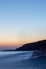 Long exposure sunset shot in portrait mode of Drymades beach Dhermi Albania