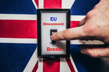 Switch with Brexit and England flag and inscription Brexit and in german EU Binnenmarkt in german...