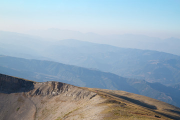Atop the mountain Tomorr in Albania overlooking flat ridge