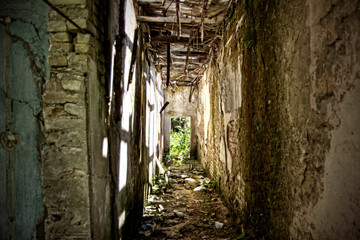 Derelict abandoded building with brown dirty walls