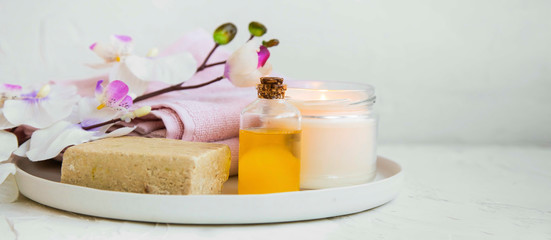 Fototapeta na wymiar Spa still life setting with organic products and orchid flower