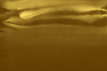 Gold luxury ink and watercolor textures on white paper background. Paint leaks and ombre effects. Hand painted vintage texture.