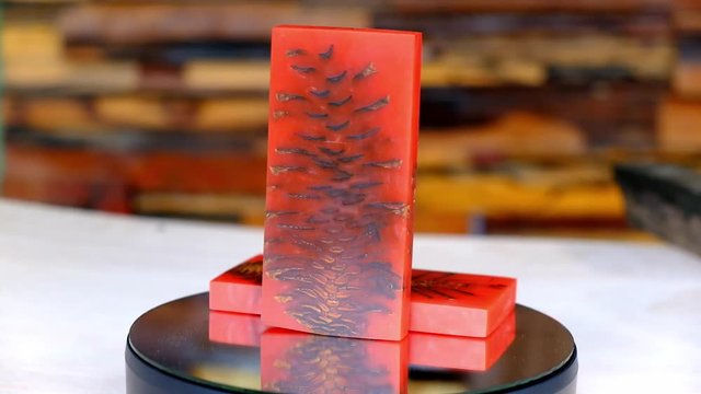 The pine cone mix epoxy resin on circular rotating turn table Plate Electric, Casting stabilizing burl wood white art for blanks