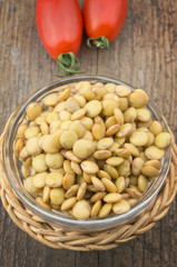 Raw lentils on wooden table