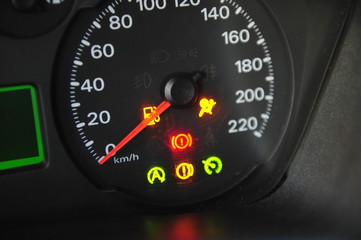 the instrument panel in the car, the speed dial on the dashboard