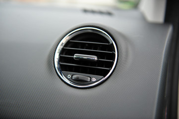 controls near the steering wheel in a modern car