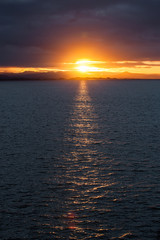 Sunset with black sea.