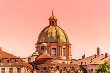 Obraz premium Gorgeous sunset over the old town and churches in Prague, Czech Republic, summer time