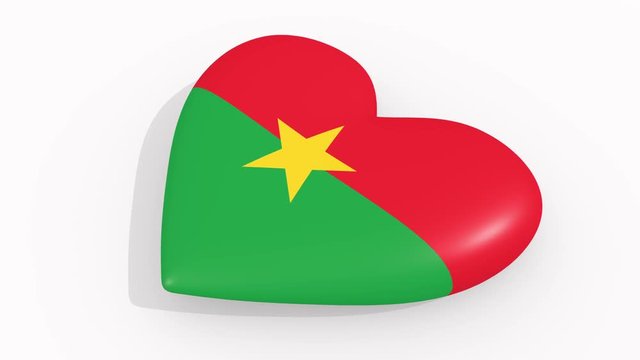 Heart in colors and symbols of Burkina Faso on white background, loop