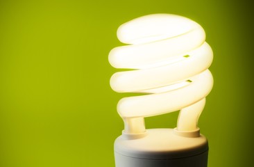 Fluorescent Bulb On Green Background Close-up