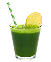 Wheat grass juice with lemon slice in glass on white background