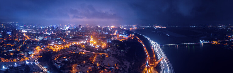 Fototapeta na wymiar Spectacular nighttime skyline of a big city at night. Kiev, Ukraine