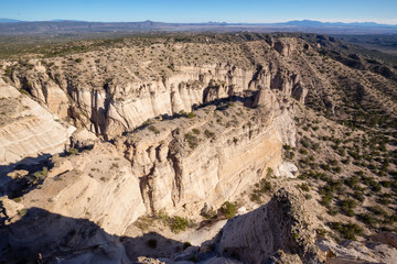 Fototapeta na wymiar Beautiful American Landscape during a sunny day. Taken in Kasha-Katuwe Tent Rocks National Monument, New Mexico, United States.