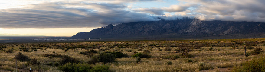 Beautiful Panoramic American Landscape during a cloudy sunrise. Taken North of El Paso, New Mexico, United States.