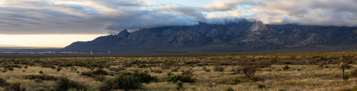 Beautiful Panoramic American Landscape during a cloudy sunrise. Taken North of El Paso, New Mexico, United States.