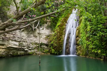 Foto op Canvas Waterval in natuurlijke grot. Bad van Aphrodite. Cyprus. © anatoliil
