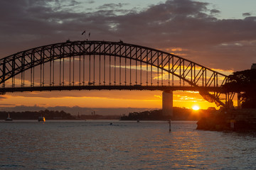 Fototapeta na wymiar Sidney Harbor and bridge at sunset