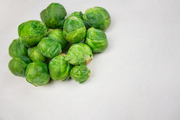  Fresh brussels sprouts pile isolated on white background. isolate