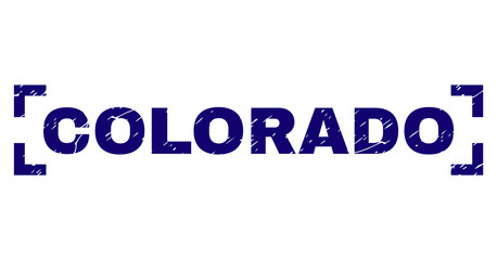 COLORADO label seal print with grunge effect. Text label is placed between corners. Blue vector rubber print of COLORADO with retro texture.