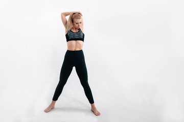 young athletic girl doing stretching