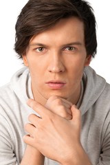 Portrait of young thoughtful man, isolated