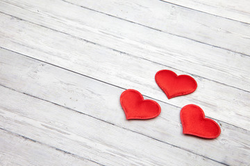 Red heart on white wooden Background. copy space Valentines and 8 March Mother Women's Day concept