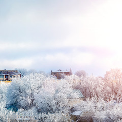 winter city landscape with snow and blue sky
